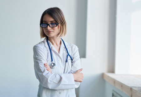 female doctor white coat professional medicine stethoscopeの写真素材