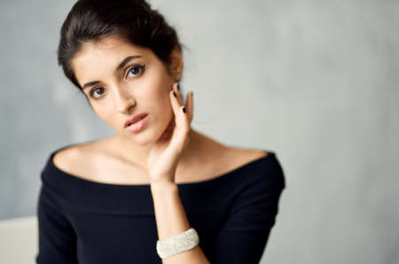 pretty woman in black dress decoration luxury fashion cropped view