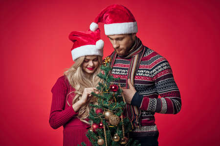 married couple christmas tree toys decoration isolated backgroundの写真素材