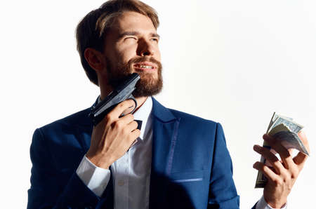 man in a suit finance success light backgroundの写真素材