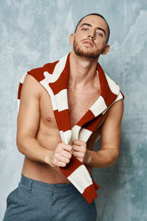 male naked full torso striped sweater posing fashion sexy styleの写真素材