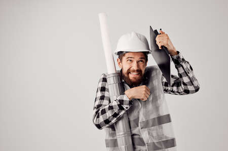 engineer in a white helmet blueprints Professional studio industryの写真素材