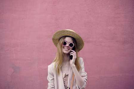 beautiful woman outdoor walk fashion summer pink wall Lifestyle