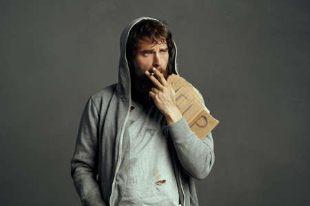 homeless man with a cigarette poverty depression money problems