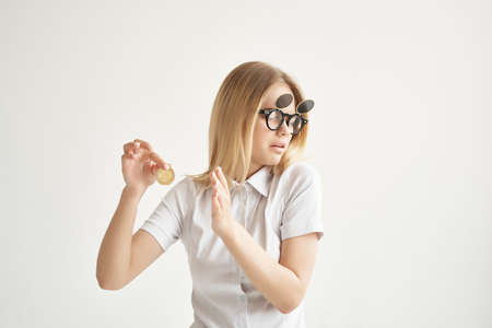 financier in a white shirt with a folder in hand isolated backgroundの写真素材