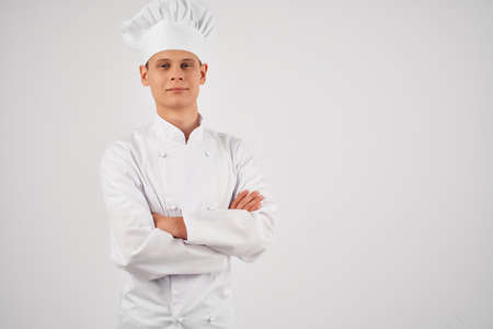 a man in a chefs uniform self-confidence professionals workの写真素材