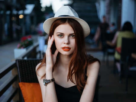 beautiful woman in hat summer cafe vacation home lifestyle