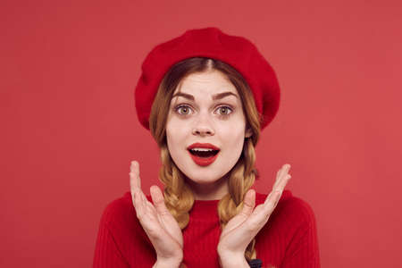 beautiful woman in a red sweater cosmetics emotion isolated backgroundの写真素材