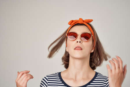 woman wearing sunglasses modern clothing fashion posing lifestyleの写真素材