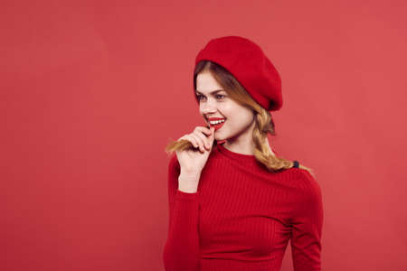 cheerful woman in a red sweater cosmetics emotion isolated background