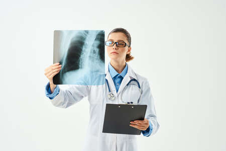 radiologist with x-ray health care hospital work