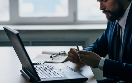 businessmen in the office in front of a laptop executive managerの写真素材