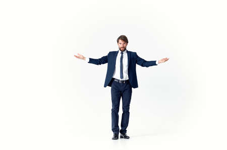 a man in a jacket and tie movement Jump light background