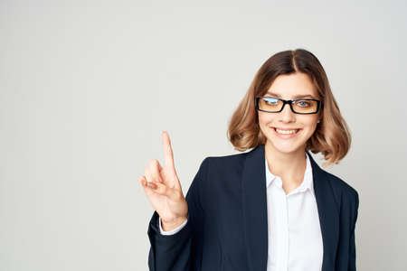 Business woman in black suit posing fashion work professionalの写真素材