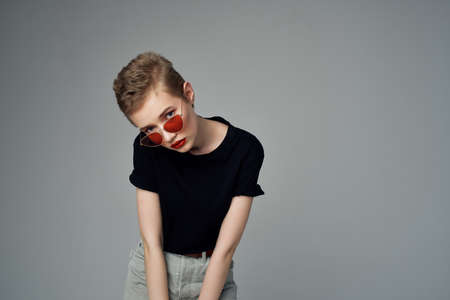 beautiful woman hand gesture Red lips glamor dark backgroundの写真素材