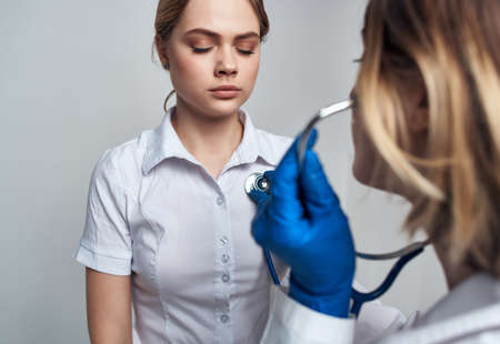 nurse stethoscope healing procedures isolated backgroundの写真素材