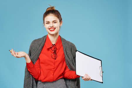 Business woman red shirt secretary office blue background