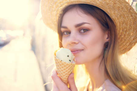 attractive woman on the street with ice cream vacation Lifestyle