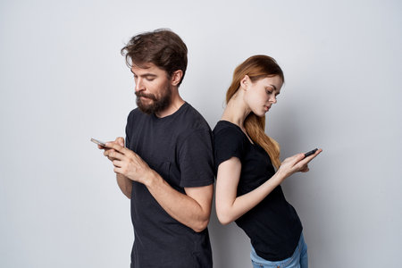 cheerful young couple hug communication friendship posing isolated backgroundの写真素材