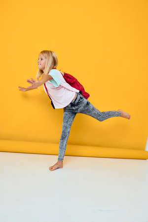 little girl stylish clothes red backpack isolated background