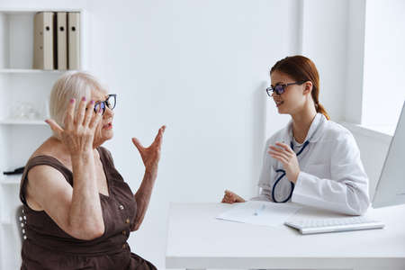 female doctor conversation with the patient professional adviceの写真素材