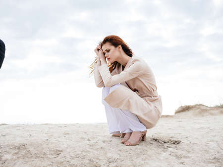 woman near stone rocks lifestyle fashionの写真素材