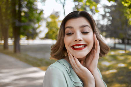 pretty woman outdoors walk glamor posing Fresh airの写真素材