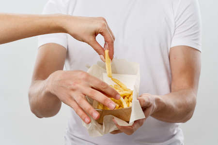 fast food french fries snack lifestyle light backgroundの写真素材