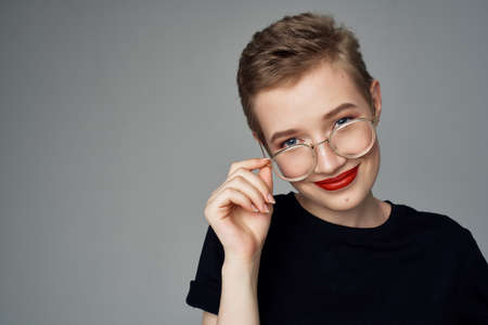 pretty woman black T-shirt modern style isolated backgroundの写真素材