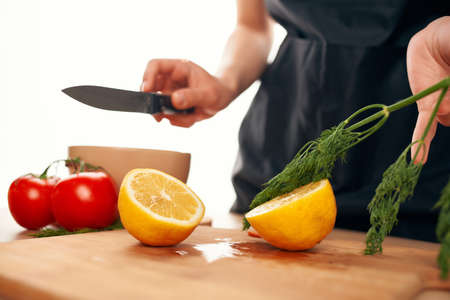lemon slicing cutting board salad ingredient healthy food vitaminsの写真素材