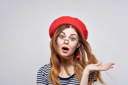 beautiful woman wearing glasses posing fashion attractive look red earrings jewelry summerの写真素材