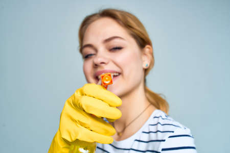 cheerful housewife cleaning supplies lifestyleの写真素材