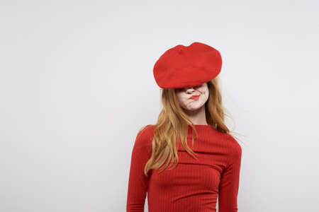 beautiful woman hand gesture fun Red lips luxury light backgroundの写真素材