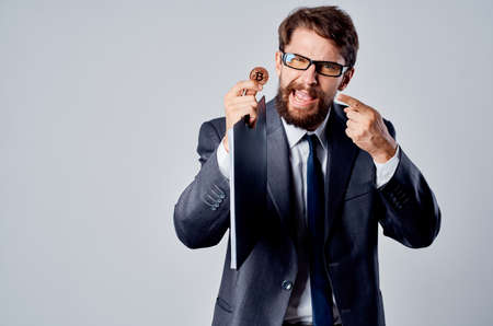 emotional man internet technology commerce bitcoin mining light backgroundの写真素材