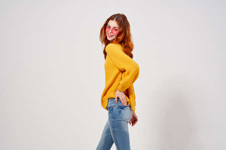 woman in fashionable glasses hairstyle posing Studio fun model
