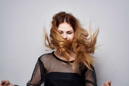 pretty woman Hairstyle fashion decoration tending luxury model light backgroundの写真素材