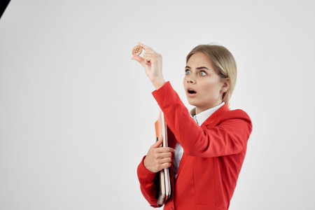 Businesswoman Bitcoin cryptocurrency in hands isolated background