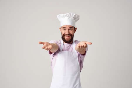 emotional male chef gesturing with hands kitchen professional workの写真素材