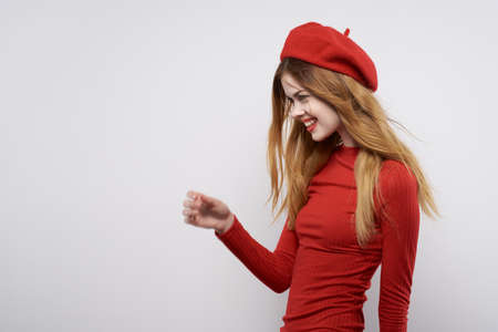 beautiful woman in a red sweater cosmetics emotion isolated backgroundの写真素材