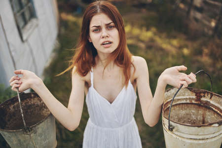 woman in white dress summer countryside nature Lifestyleの写真素材