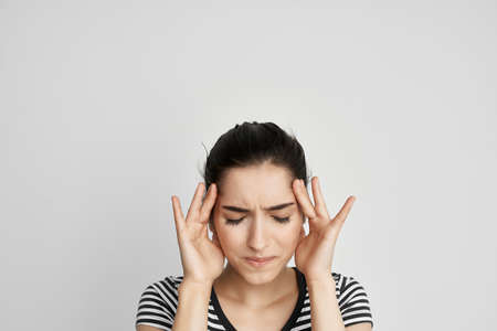 brunette headache painful syndrome discomfort health problemsの写真素材