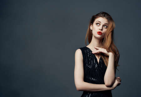 beautiful woman Red hair charm posing cosmetics isolated backgroundの写真素材