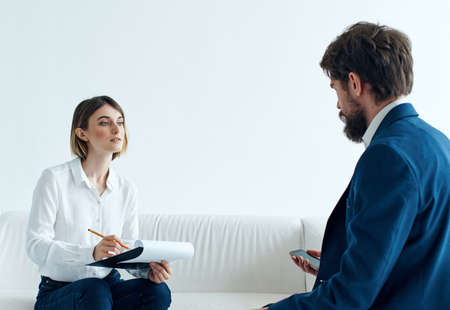 man and woman communicate work team documentsの写真素材