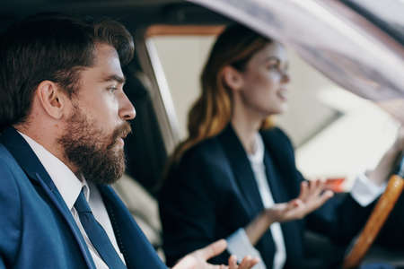 Man and woman driving a car Lifestyleの写真素材