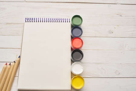 drawing pad watercolor paints pencils tools for artistの写真素材