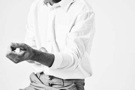 handsome man with trendy hairstyle white shirt studio lifestyleの写真素材