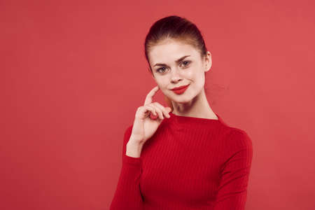 woman in red dress smile hairstyle makeupの写真素材