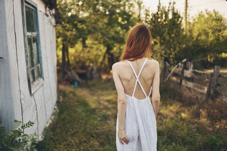 woman in white dress outdoor fun nature Lifestyleの写真素材