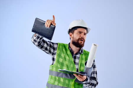 male builder with documents and drawings blueprints studio industryの写真素材
