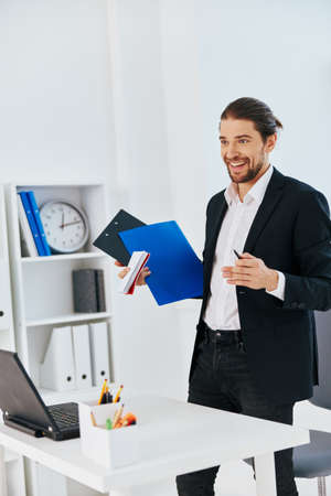 Man workflow in the office documents emotions technologyの写真素材